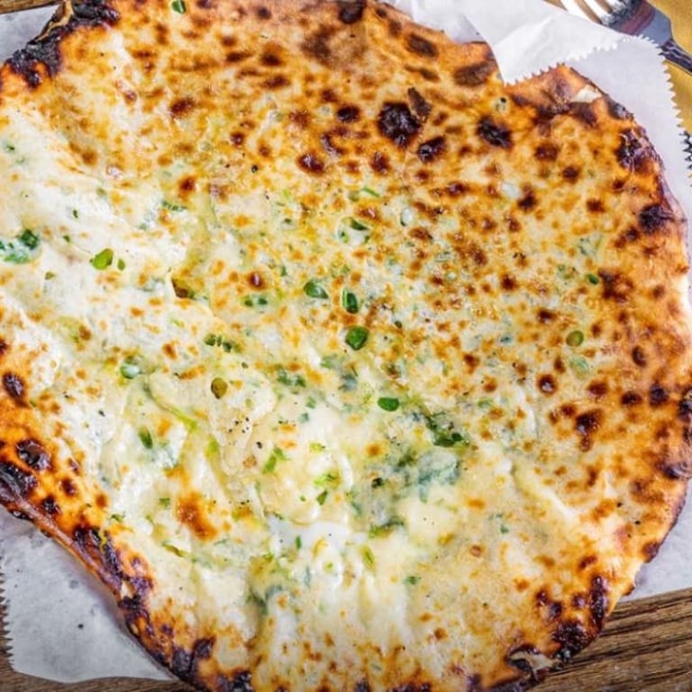 Savor our authentic naan